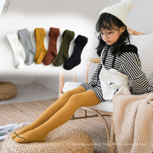 Vente en gros de mode épais coton peigné jacquard tissage personnalisé enfants tout-petits enfants Leggings collants antidérapants enfant chaussettes de sol